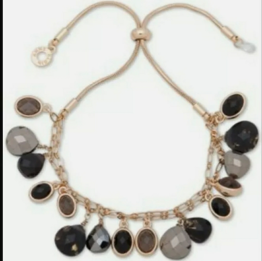 Gold Tone With Dark Stones Adjustable Bracelet 10$
